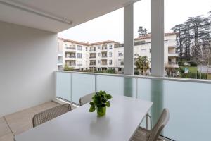 Appartements Cocon Decinois Groupama parking Balcon Eurexpo : photos des chambres