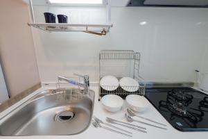 Higashi Komagata House by Tranova