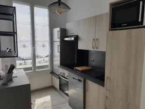 Appartements Un trois etoile entre La Rochelle et les marais poitevin : photos des chambres