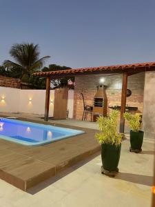 Casa com piscina para veraneio em Barra do Itariri - Bahia