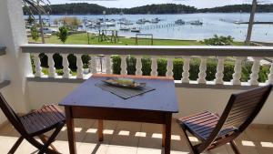 Apartmani Devcic - 4hvězdičkové hotely ve městě Rab