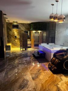 Appartements Krystalisya Room Suite Spa Privatif Sauna Jacuzzi Siege Massant : photos des chambres