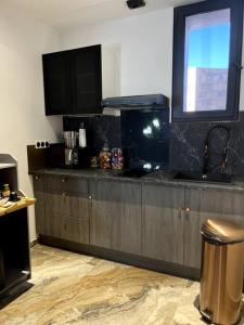 Appartements Krystalisya Room Suite Spa Privatif Sauna Jacuzzi Siege Massant : photos des chambres