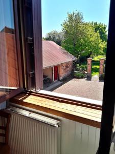 Appartements Gite Aux Anciennes Ecuries : photos des chambres