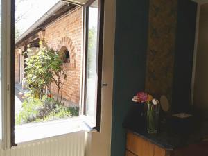 Appartements Gite Aux Anciennes Ecuries : photos des chambres