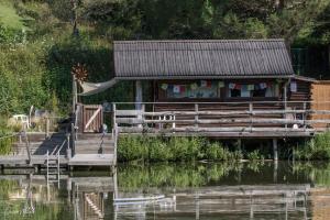 Chalets La cabane sur le lac aux Temps des Sources : photos des chambres