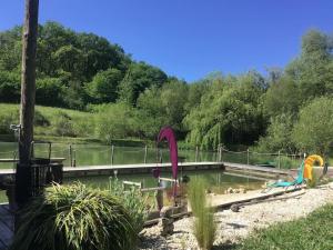 Chalets La cabane sur le lac aux Temps des Sources : photos des chambres