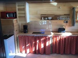 Chalets La cabane sur le lac aux Temps des Sources : photos des chambres