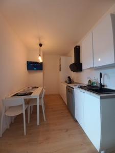 Appartements Le 29 spacieux , wifi et climatisation : photos des chambres