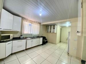 Casa Grande com 2 quartos e 1 suíte