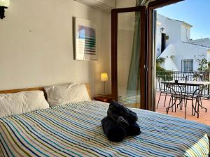 Casa con terraza y hermoso jardín comunal