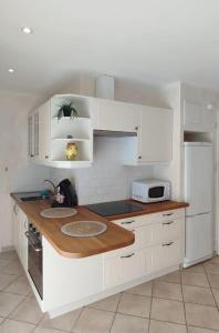 Appartements T2 CALME + cadre verdoyant : photos des chambres