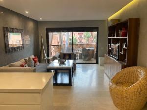 APP. Traversant au GUELIZ + Piscine sur le toit