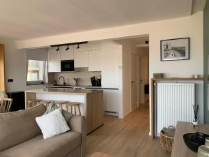 Les pieds dans le sable