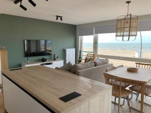 Les pieds dans le sable