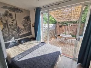 Appartements Le Moorea 2 est a 5 min de l'hyper centre et plages : photos des chambres