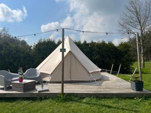 Glamplodge met privé sanitair