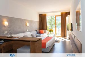 Junior Suite with Partial Lake View room in Parco San Marco Lifestyle Beach Resort