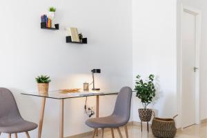 Leones Home, parking y vistas al río