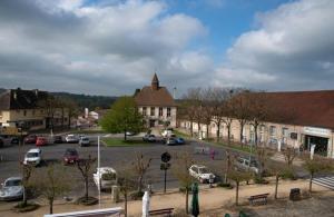 Appartements La Licorne -2eme etage avec terrace - centre bourg : photos des chambres