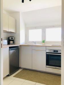 Appartements Esmee - Havre de Charme sous les Toits : photos des chambres