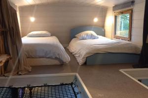 Maisons de vacances Mini maison tiny house et son bain nordique : photos des chambres