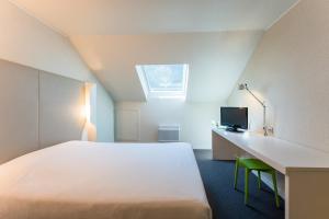 Hotels Campanile Rouen Sud - Zenith - Parc Expo : photos des chambres