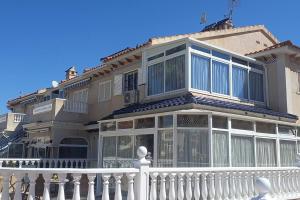 Spacious ground floor apartment overlooking the beautiful communal pool