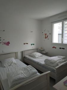 Maisons de vacances Chez CATHY & GUY a Tharon plage - 4/5 personnes : photos des chambres