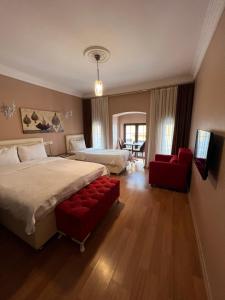 Luxury Triple Room room in Zendy Suite Hotel
