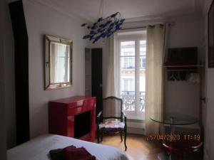 B&B / Chambres d'hotes Bed and Breakfast Paris Centre : photos des chambres