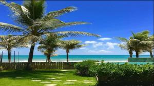 Casa pé na areia com garagem na Praia de Guarajuba