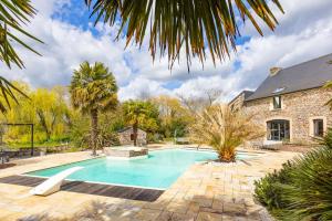 Maisons de vacances La Luardiere - Maison avec piscine et jacuzzi : photos des chambres