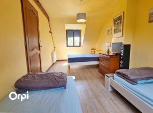 Maisons de vacances Ref 022 - Grande maison pour dix personnes avec jardin et palmier : photos des chambres