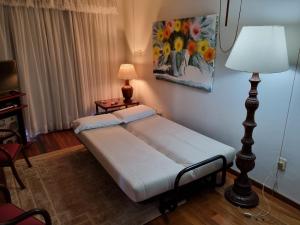 Apto aconchegante quarto e sala reversível