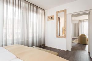 Modern Junior Suite with Lake View room in Hotel Du Lac