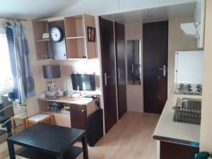 Campings Mobil-home 4 Places - proche lac : photos des chambres