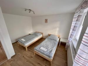 Monteurunterkunft Simmershausen - Parken, Waschen und Wifi inklusive