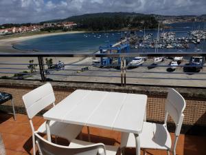 ÁTICO SANXENXO CON TERRAZAS Y VISTAS AL MAR