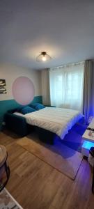 Appartements Le Pourpre : photos des chambres