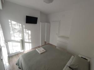 Beach House Garden, 300m dal mare, wifi, bici, giardino privato, clima