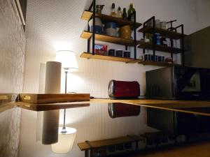 Maisons de vacances La Maison Rouge Au coeur de la ville. : photos des chambres