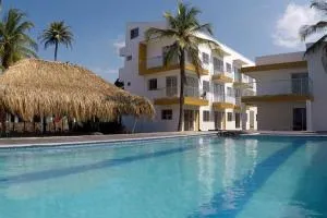 Apto 1er piso frente a la playa y con piscina - Moñitos