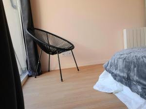 Appartements L'ilot - Cosy moderne avec parking : photos des chambres