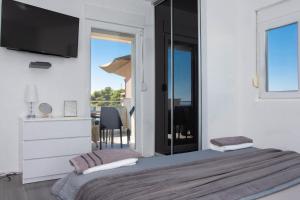 Apartments by the sea Kastel Stafilic, Kastela - 21087