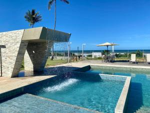 Kalug - Duplex PÉ NA AREIA com 4 suítes, piscina e churrasqueira privativa na Praia do Sul! Perfeito para família - Wifi 300mb!