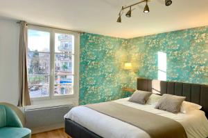 Appartements Appart Deluxe - Centre historique LIMOGES : photos des chambres