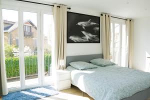 EXIGEHOME-Maison de standing-3 appartements-30 minutes de Paris : photos des chambres