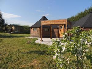 Chalets CHALET ATYPIQUE LOLA type KOTA location en gite : photos des chambres