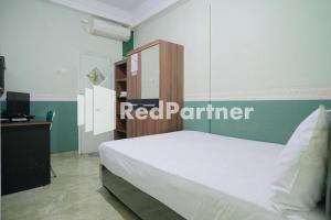 Pondok Hijau Syariah Mitra RedDoorz At Citraland Surabaya